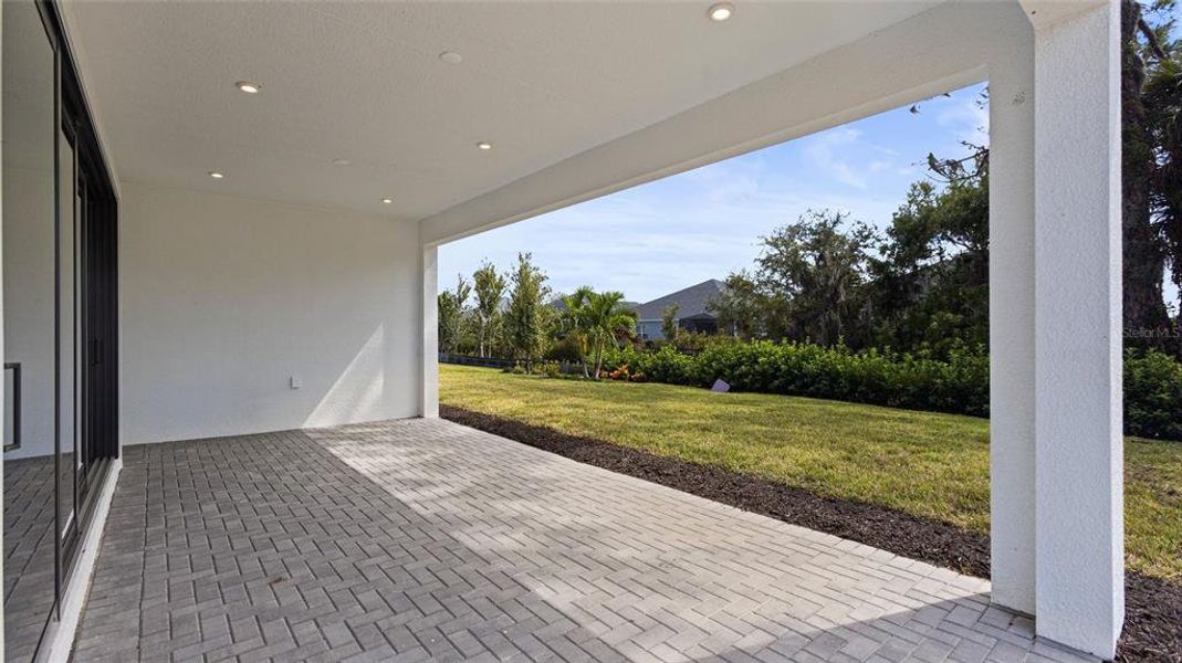 Exterior details and patio area of a home in Woodland Preserve, Parrish (Image 4).
