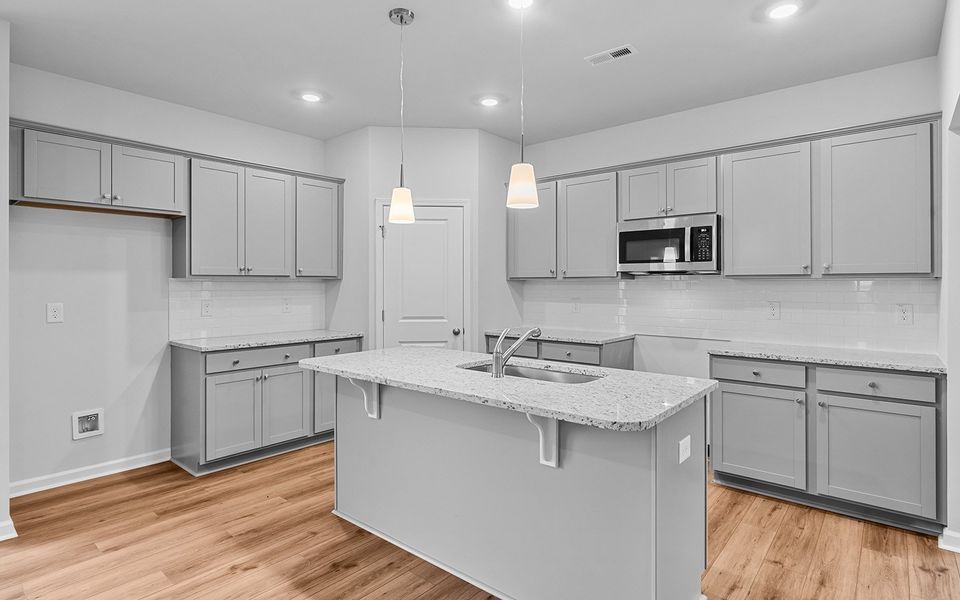 Furnished interior view inside a new home in Fieldstone, Lexington (Image 7).