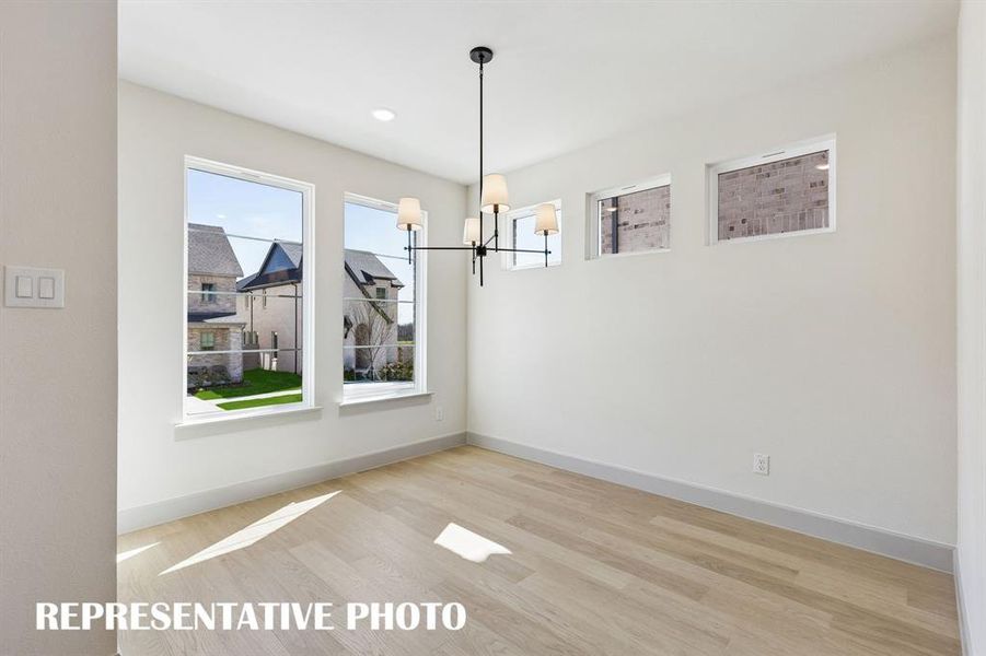 Whether it's lively dinner parties or cozy family gatherings, this light filled dining room fits all occasions!  REPRESENTATIVE PHOTO