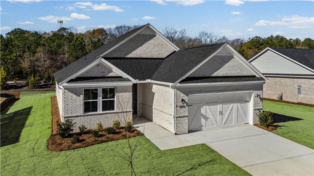 Front exterior of a new home in Overland, Locust Grove, GA, highlighting curb appeal (Image 19).