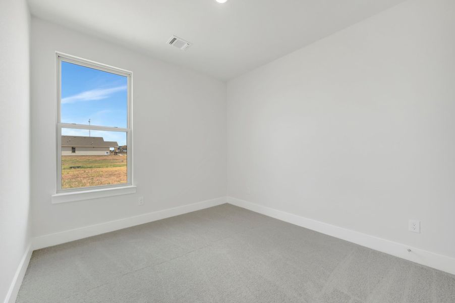 Spacious, unfurnished interior of a new home in The Meadows, Denton (Image 26).