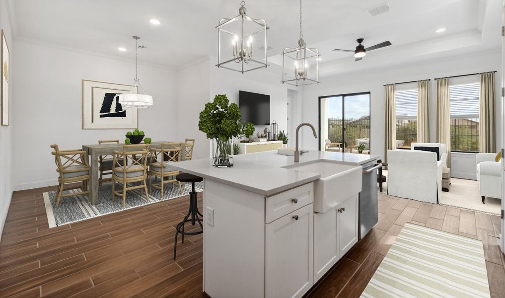 Kitchen with pendant lighting overlooking the great room Kitchen with pendant lighting overlooking the great room