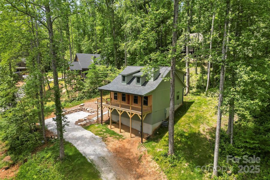 Front exterior of a new home in , Marion, NC, highlighting curb appeal (Image 24).