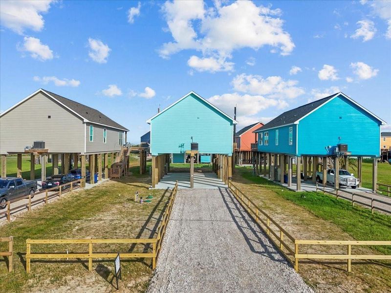 Front exterior of a new home in , Surfside Beach, TX, highlighting curb appeal (Image 2). Front exterior of a new home in , Surfside Beach, TX, highlighting curb appeal (Image 2).
