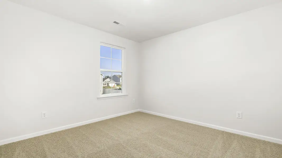 Spacious, unfurnished interior of a new home in Cambridge Park, Mebane (Image 18).