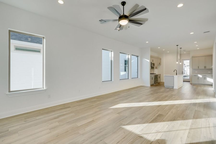 Spacious, unfurnished interior of a new home in The Porch at Du Pre, Buda (Image 4).
