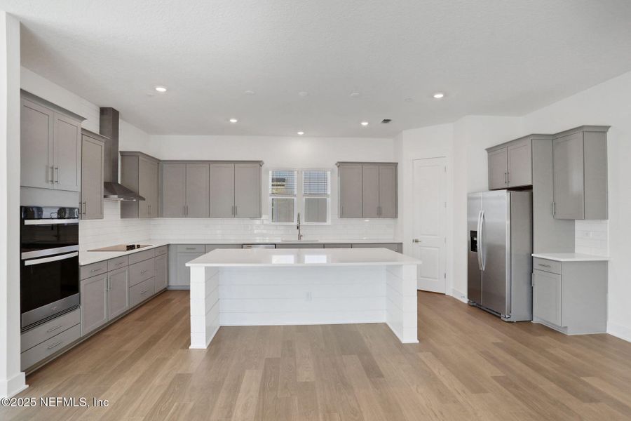 Furnished interior view inside a new home in North Beach Townhomes, Jacksonville Beach (Image 11).