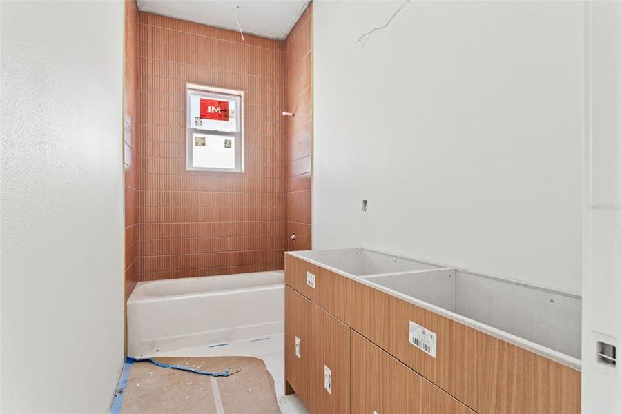 In-progress construction of a new home in , Seminole, FL (Image 7).