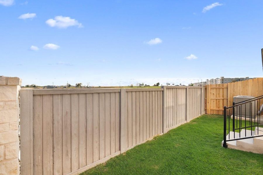 Exterior details and patio area of a home in Union Collection at Park Central, Georgetown (Image 28).