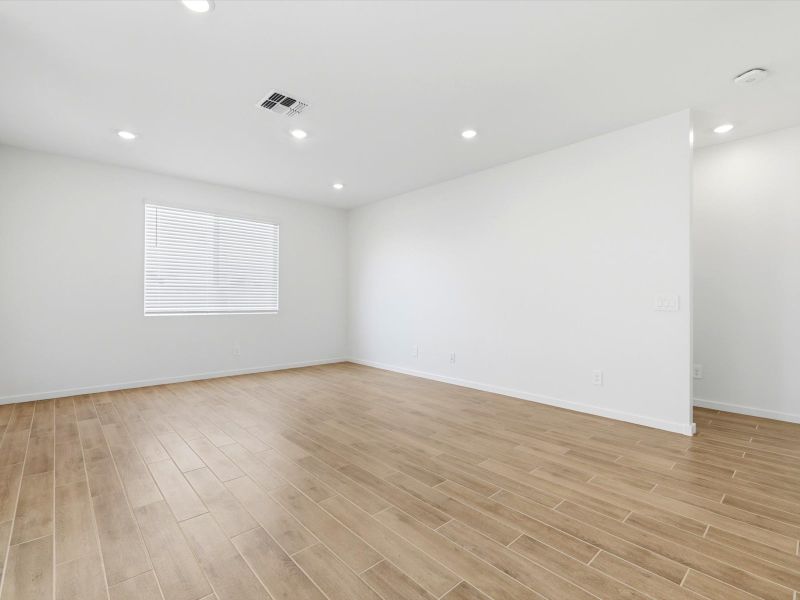 Spacious, unfurnished interior of a new home in Blossom Rock Reserve Series, Apache Junction (Image 11).