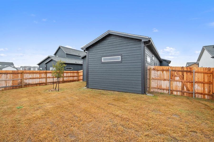 View of fenced backyard