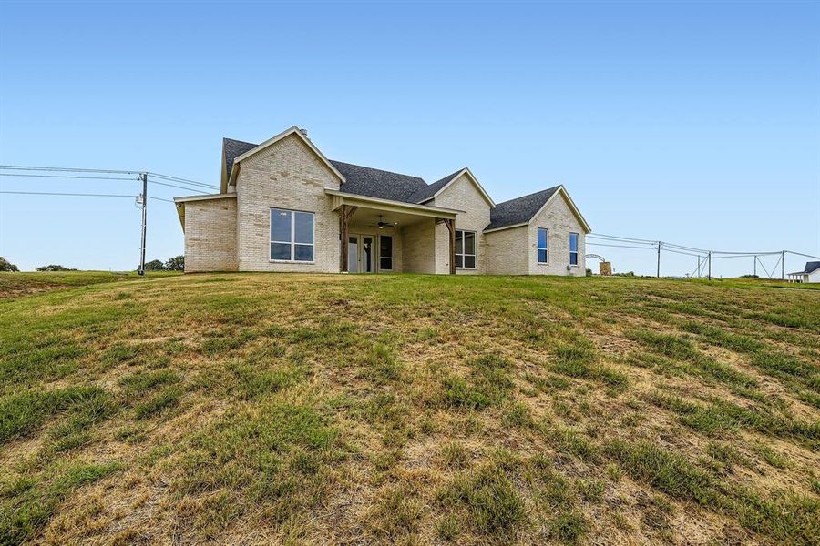 Exterior details and patio area of a home in , Springtown (Image 4). Exterior details and patio area of a home in , Springtown (Image 4).