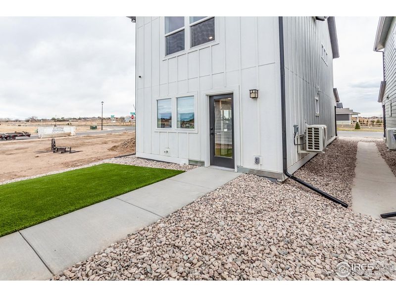 Exterior details and patio area of a home in Prairie Song Story Collection - Single Family Homes, Windsor (Image 22).