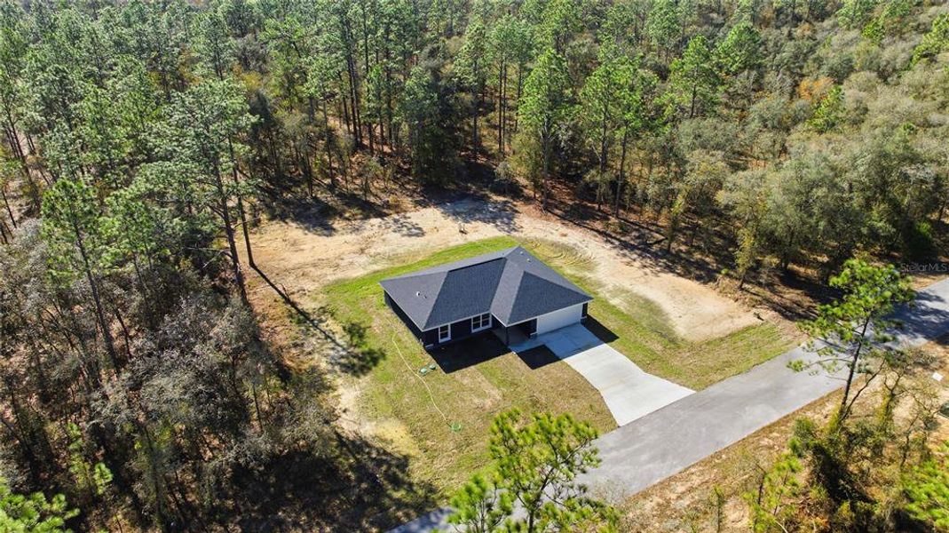 Front exterior of a new home in , Dunnellon, FL, highlighting curb appeal (Image 19). Front exterior of a new home in , Dunnellon, FL, highlighting curb appeal (Image 19).