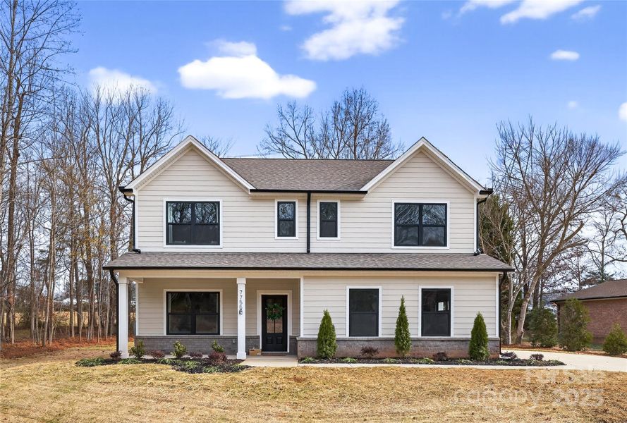 Front exterior of a new home in , Denver, NC, highlighting curb appeal (Image 24).