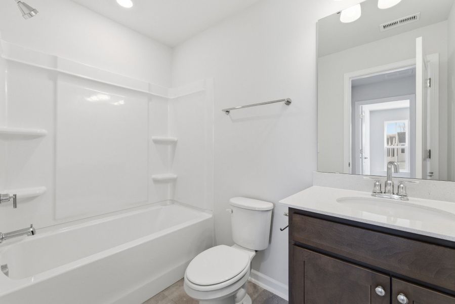 Furnished interior view inside a new home in Poets Walk, Whitsett (Image 34).