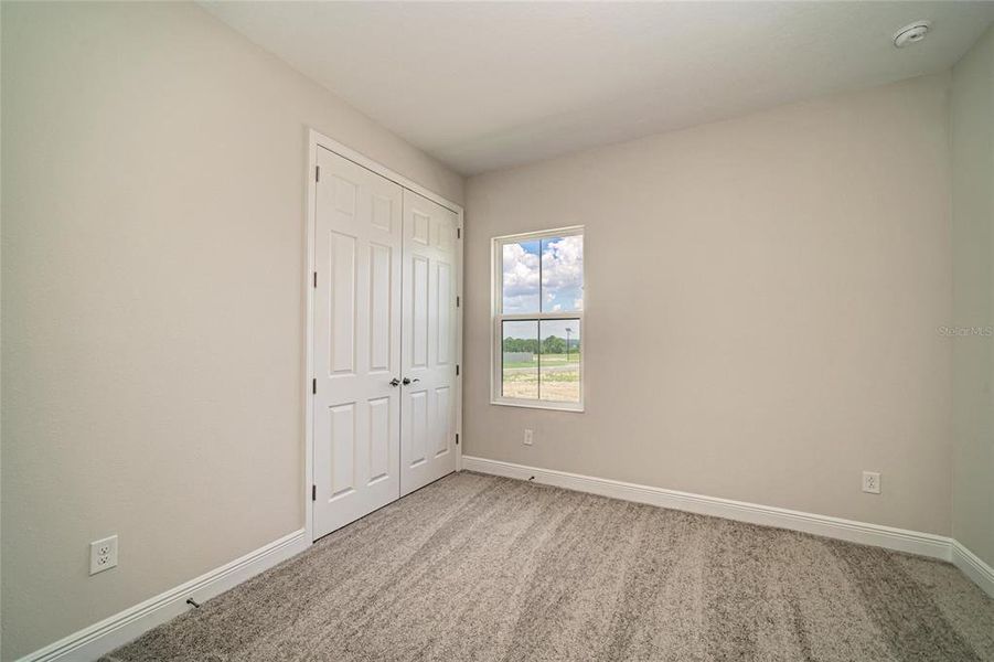 Spacious, unfurnished interior of a new home in Pasadena Ridge, Dade City (Image 25).