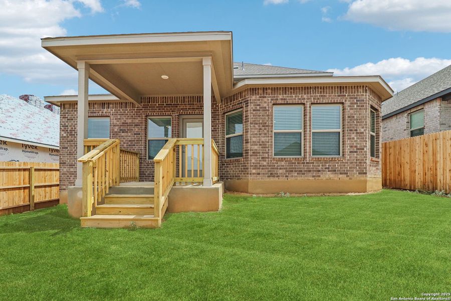 Front exterior of a new home in Arcadia Ridge - Premier Series, San Antonio, TX, highlighting curb appeal (Image 2).