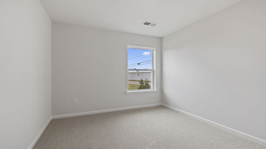 Spacious, unfurnished interior of a new home in Tanglewood Townes, Greenville (Image 23).