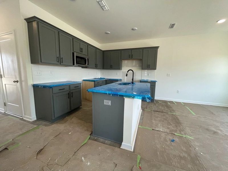 Kitchen featuring the AW Collection® Minimalist - Bold surfaces, clean lines, modern edge. Kitchen featuring the AW Collection® Minimalist - Bold surfaces, clean lines, modern edge.