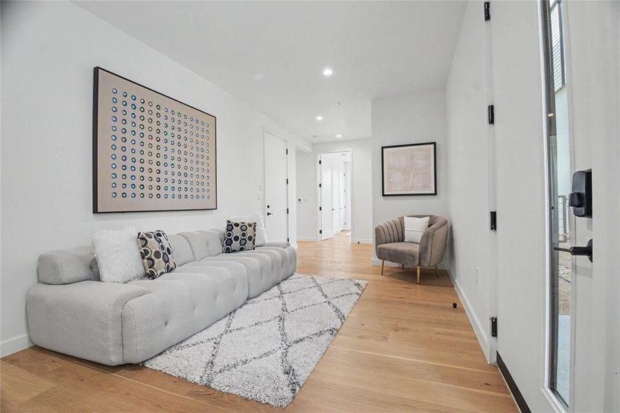 Entrance with a living area, two bedrooms, and full bath.