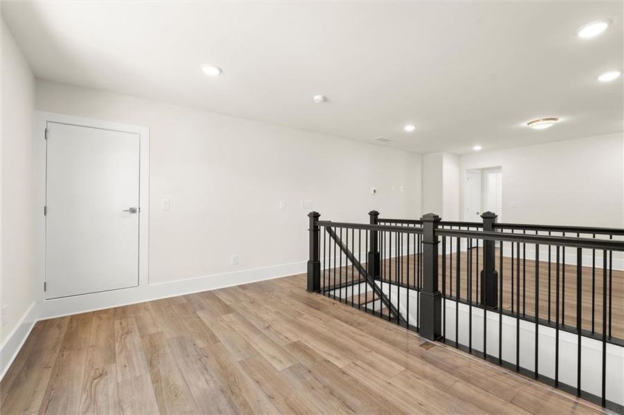 Spacious, unfurnished interior of a new home in Hillgrove Preserve, Powder Springs (Image 28).