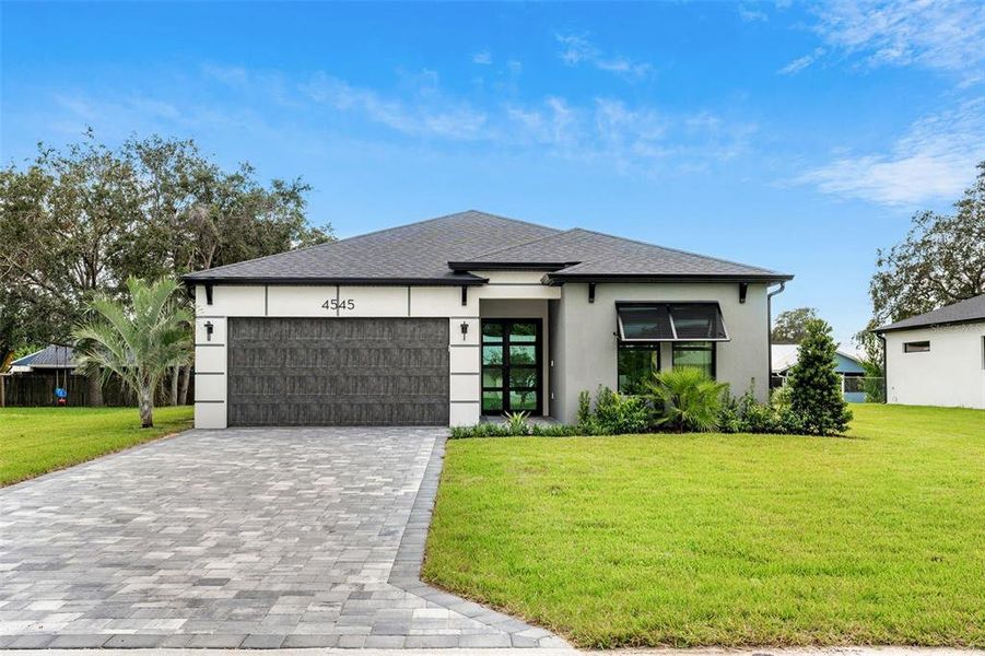 Front exterior of a new home in , Cocoa, FL, highlighting curb appeal (Image 23).