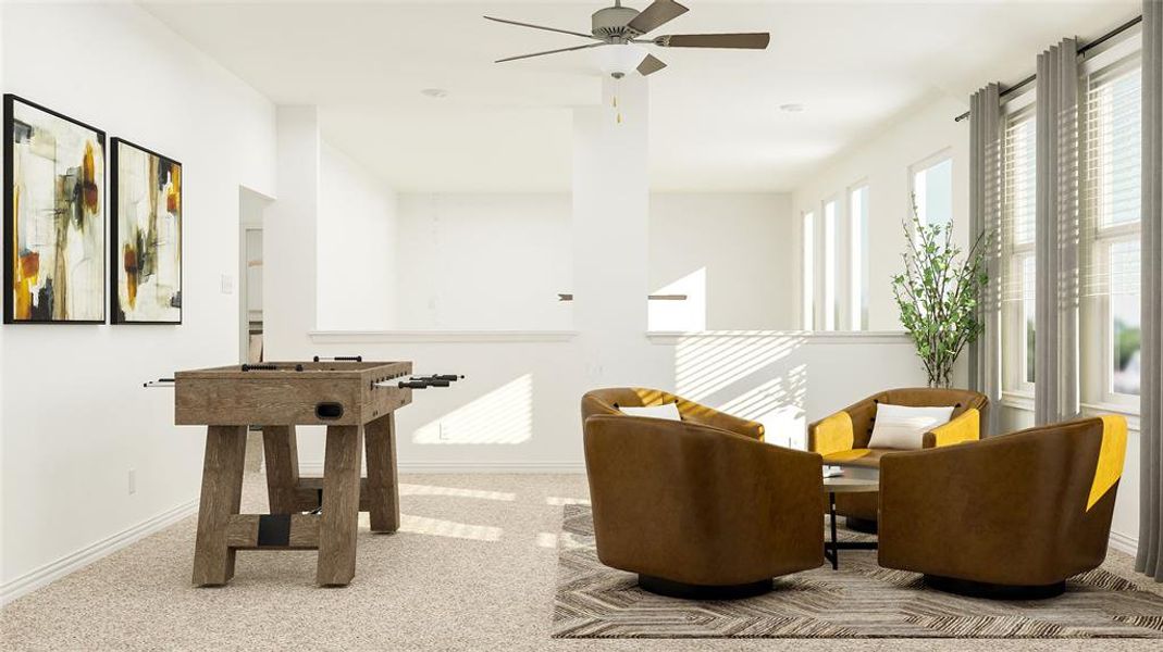 Sitting room featuring light carpet