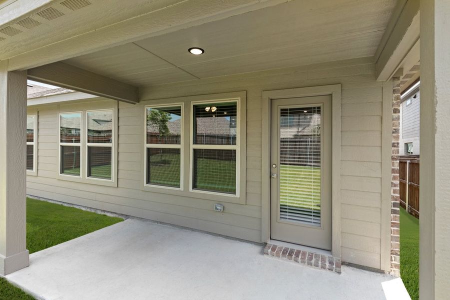 Front exterior of a new home in De Berry Reserve, Royse City, TX, highlighting curb appeal (Image 28). Front exterior of a new home in De Berry Reserve, Royse City, TX, highlighting curb appeal (Image 28).