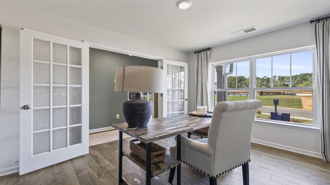 Furnished interior view inside a new home in Bentley Park, Greenwood (Image 8).