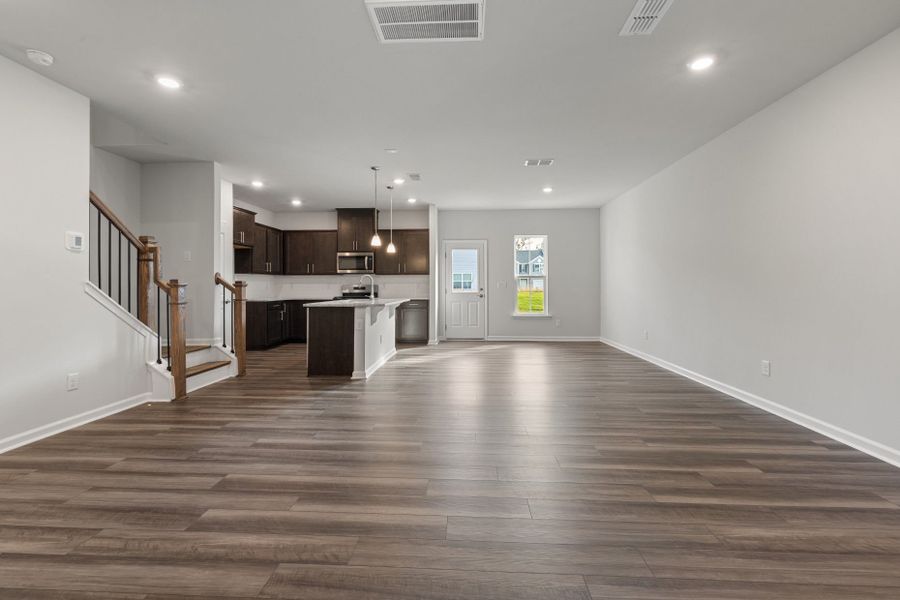 Spacious, unfurnished interior of a new home in Poets Walk, Whitsett (Image 12).