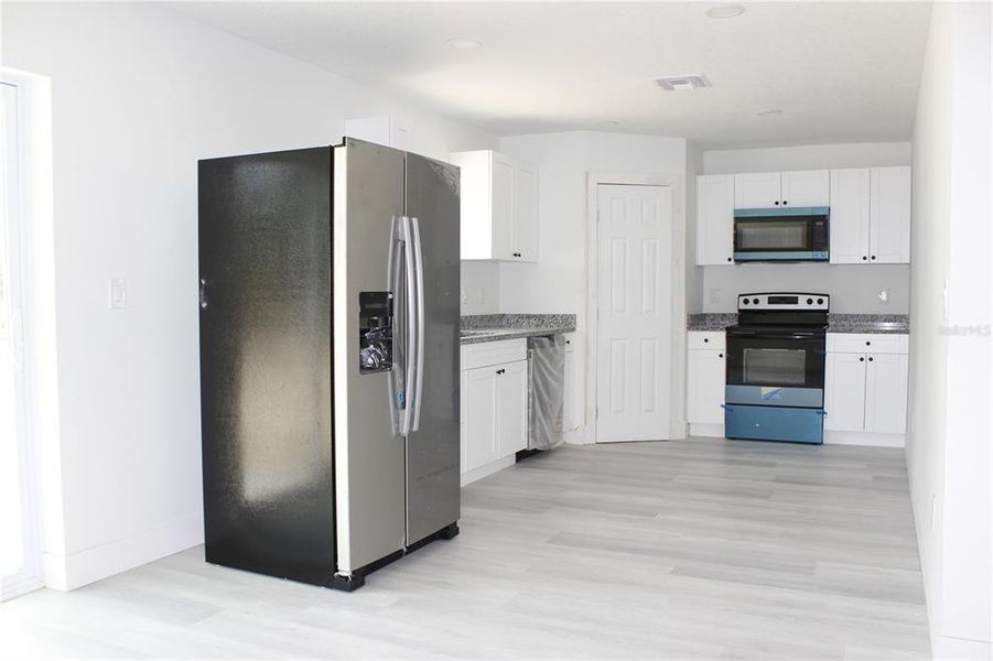 Furnished interior view inside a new home in , Spring Hill (Image 10).