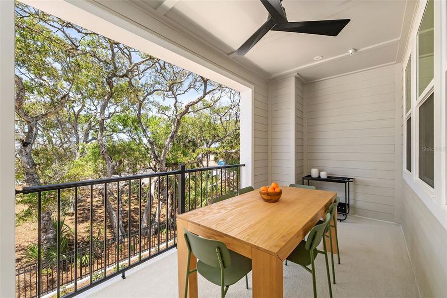 Exterior details and patio area of a home in EvenTide, New Smyrna Beach (Image 4).