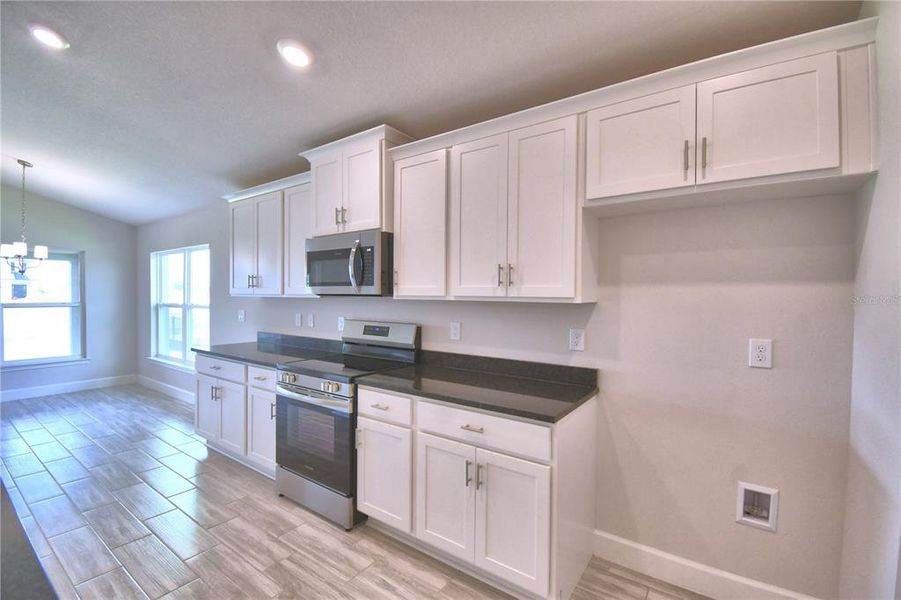Furnished interior view inside a new home in , Auburndale (Image 9).