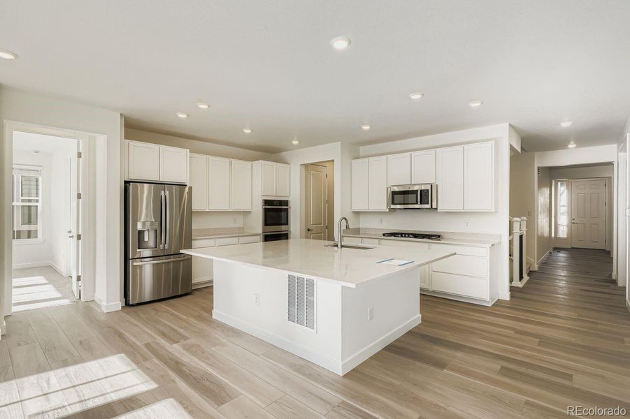 Furnished interior view inside a new home in Macanta: The Grand Collection, Castle Rock (Image 4).