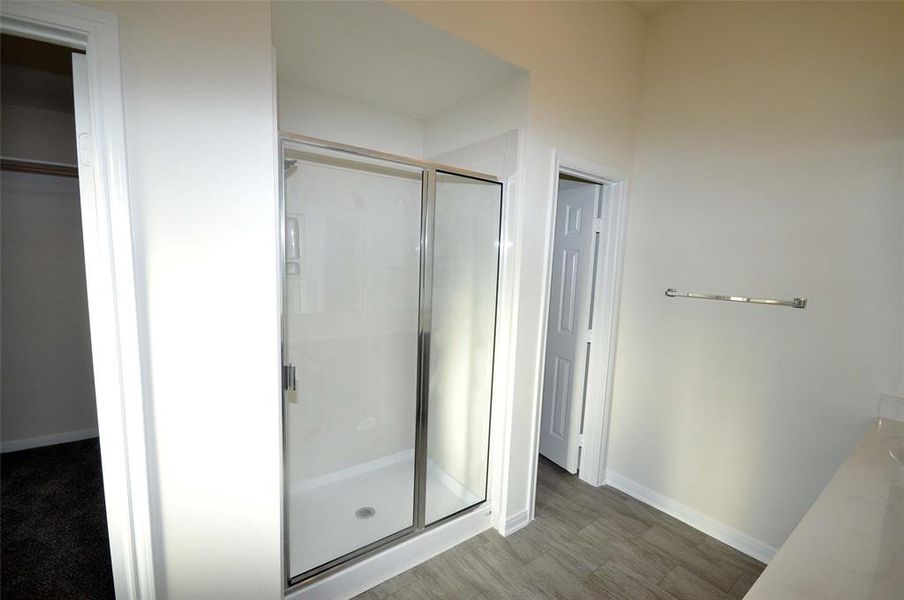 Large separate shower in master bath.