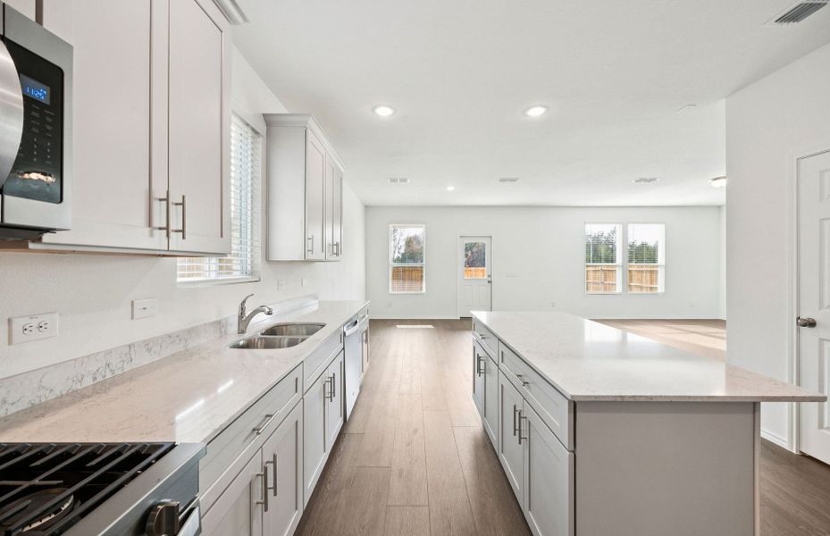 Representative furnished interior of a home built from the Camelia by Centex in Mobberly Farms, Pilot Point (Image 6).