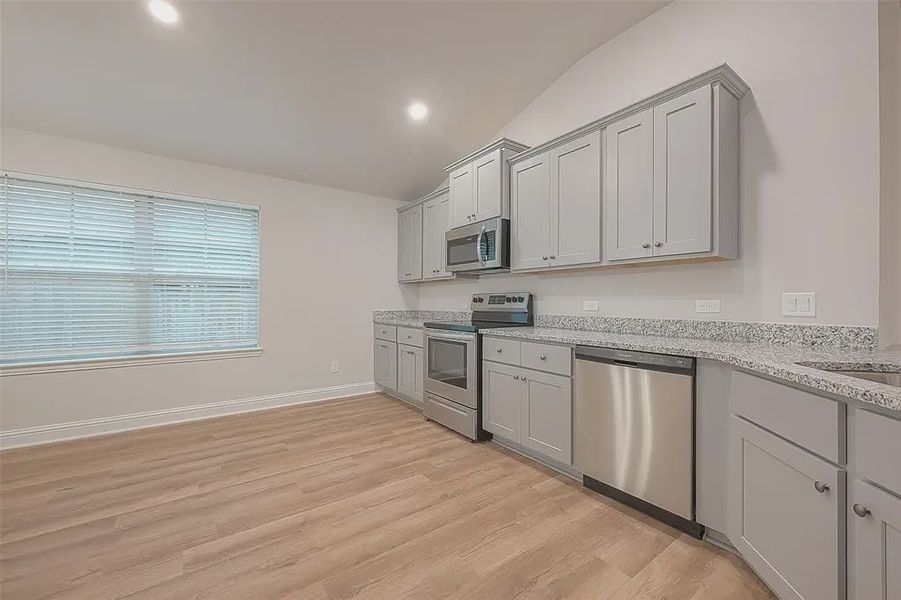 Furnished interior view inside a new home in Bayou Maison, Dickinson (Image 3).