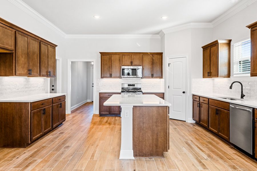 Furnished interior view inside a new home in The Bluffs at Lafayette, Freeport (Image 6).