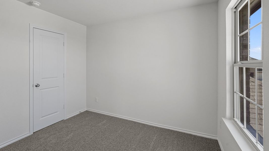 Representative unfurnished interior of a home built from the Midland by D.R. Horton in Riverfield, Josephine (Image 19).
