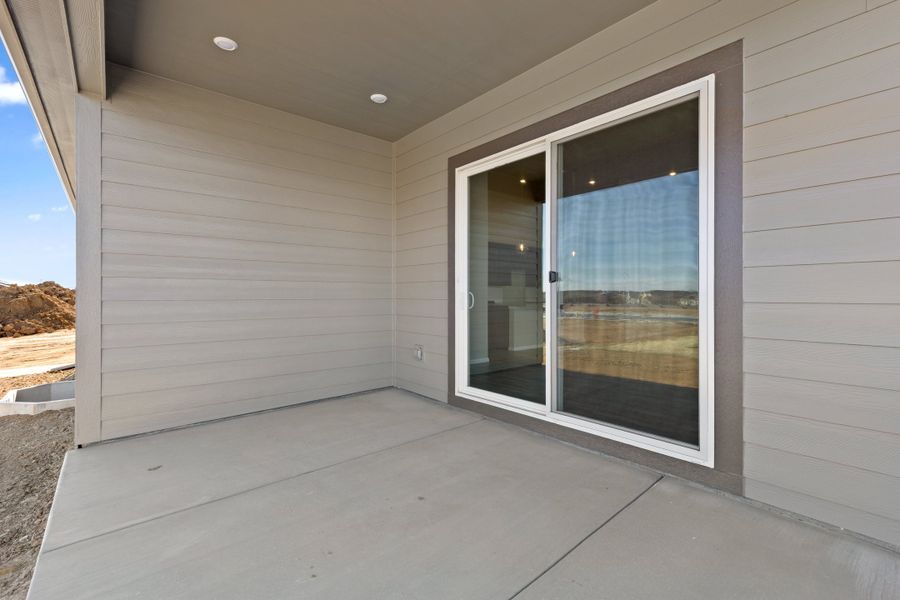 Exterior details and patio area of a home in Talon Pointe, Thornton (Image 3).