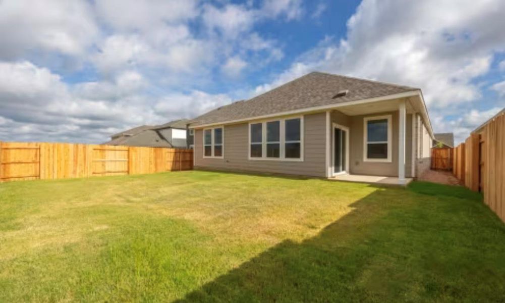 Front exterior of a new home in , Kyle, TX, highlighting curb appeal (Image 2). Front exterior of a new home in , Kyle, TX, highlighting curb appeal (Image 2).