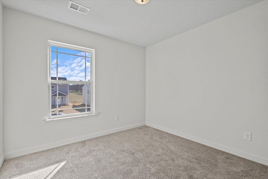 Representative unfurnished interior of a home built from the Roebuck by Enchanted Homes in Las Palomas Country Club Estates, La Vernia (Image 32).