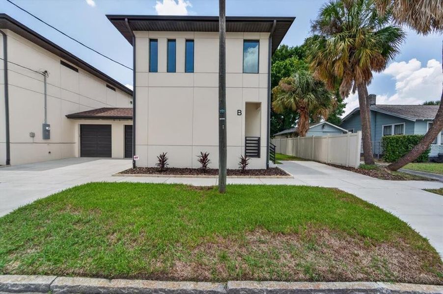 Front exterior of a new home in , Tampa, FL, highlighting curb appeal (Image 30).