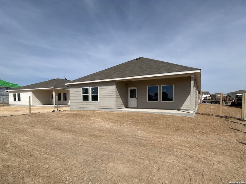 Exterior details and patio area of a home in Hennersby Hollow, San Antonio (Image 13).