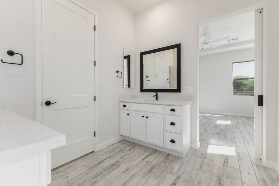 Furnished interior view inside a new home in Valencia at Granite Vista, Waddell (Image 9).