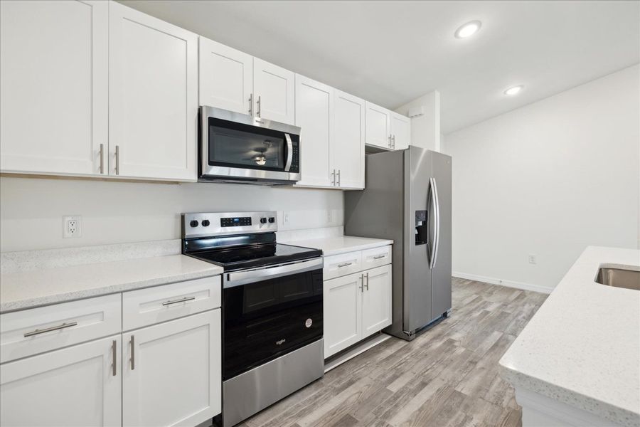 Representative furnished interior of a home built from the The Sunshine Retreat by Sunlife Homes LLC in Cape Coral, Cape Coral (Image 4).