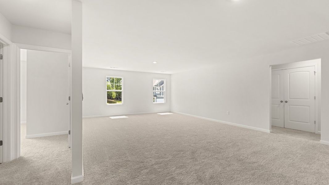 Representative unfurnished interior of a home built from the Mansfield by D.R. Horton in Falcon Landing, Gainesville (Image 21).
