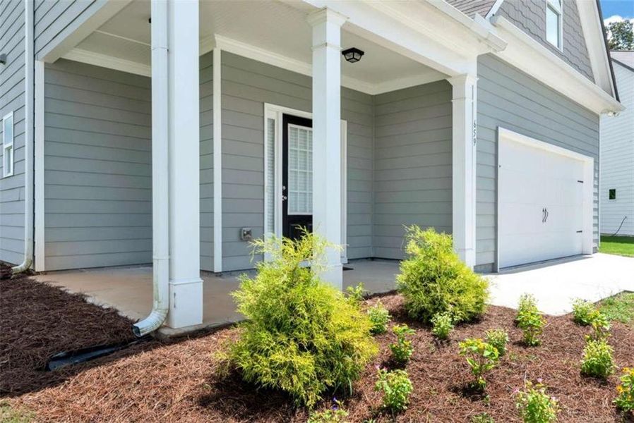 Front exterior of a new home in , Commerce, GA, highlighting curb appeal (Image 25).