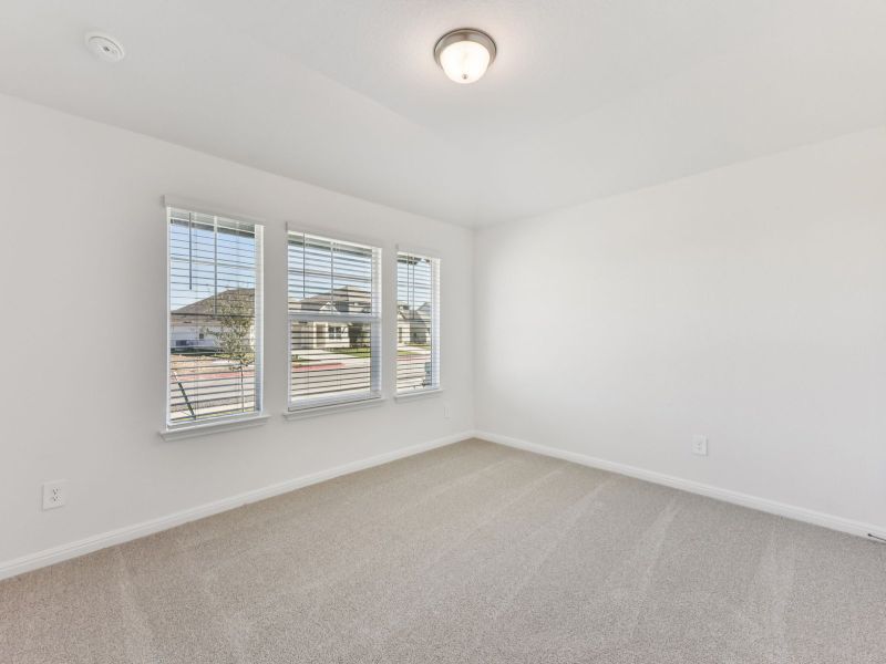 Spacious, unfurnished interior of a new home in Prairie Winds - Boulevard Collection, Hutto (Image 12).